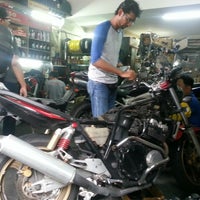 Photo taken at Planet Motorcycle Service Centre by ModFareight I. on 4/24/2014