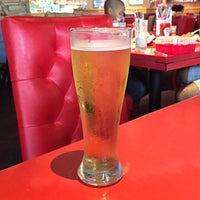 Photo taken at Red Robin Gourmet Burgers and Brews by Brian H. on 7/7/2018