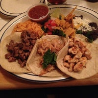 Photo taken at Mucho Gusto by Brian B. on 12/30/2012