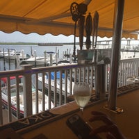 Photo taken at Tavern On The Bay by Jim M. on 7/8/2015