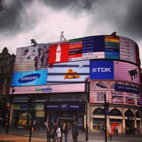 Photo taken at Piccadilly Circus by Gabe R. on 5/4/2013