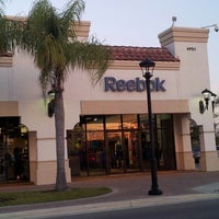 Photo taken at Reebok Outlet by Luis G. on 3/16/2013