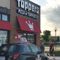 Photo taken at Toppers Pizza by Yext Y. on 5/9/2019
