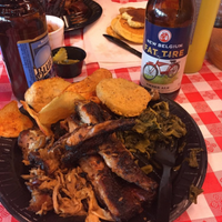Photo taken at Tom&amp;#39;s Blue Moon BBQ by Yext Y. on 11/23/2016