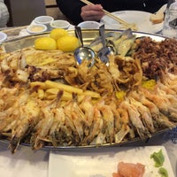 Photo taken at Ocean Basket by Mehmet D. on 2/13/2015