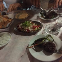 Photo taken at Kuzu Restaurant by Emre Ç. on 7/21/2015