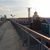 Photo taken at мост через ж/д пути вокзала by Михаил Л. on 7/9/2014