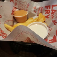 Photo taken at Red Robin Gourmet Burgers and Brews by Patricia B. on 3/30/2024