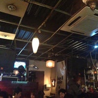 Photo taken at vinyl cafe by H H. on 12/28/2012
