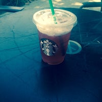 Photo taken at Starbucks by Lupita C. on 8/9/2014