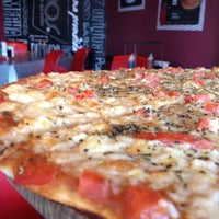 Photo taken at Pizza Mecha by CESAR V. on 12/8/2012