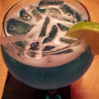 Photo taken at Roja Mexican Grill + Margarita Bar by Tim P. on 5/26/2013