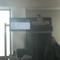 Photo taken at Gate 60 by Chris T. on 8/29/2017