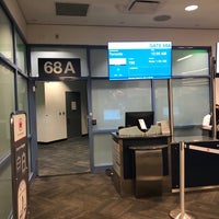 Photo taken at Gate 68A by Chris T. on 8/2/2019