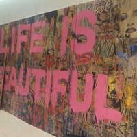 Photo taken at Mr. Brainwash Pop-Up: Life is Beautiful by Leigh F. on 8/15/2015