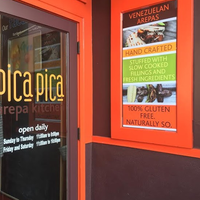 Photo taken at Pica Pica Arepa Kitchen by Pica Pica Arepa Kitchen on 3/1/2016