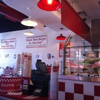 Photo taken at Five Guys by Victor C. on 7/4/2013