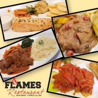 Photo taken at Flames Restaurant by Peter F. on 9/15/2020