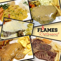 Photo taken at Flames Restaurant by Peter F. on 10/10/2020