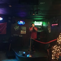 Photo taken at O&amp;#39;Shucks Pub &amp;amp; Karaoke Bar by Olga N. on 12/8/2014