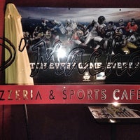 Photo taken at D&amp;#39;Macho Pizzeria &amp;amp; Sports Café by Santiago B. on 9/28/2013