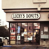 Photo taken at Lucky&amp;#39;s Donuts by ern s. on 12/3/2013