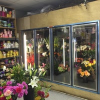 Photo taken at Rogers Park Florist by Bill T. on 6/18/2016