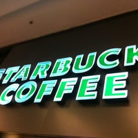 Photo taken at Starbucks by Fabio C. on 12/14/2012