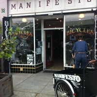 Photo taken at Manifesto Bicycles by Laura E. on 8/17/2013