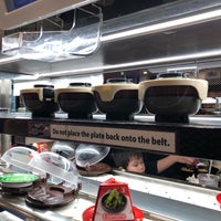 Photo taken at Kura Revolving Sushi Bar by Ammy P. on 4/18/2018
