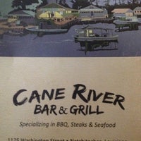 Photo taken at Cane River Bar &amp;amp; Grill by Kyra on 7/28/2012