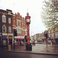 Photo taken at Harlesden Town Centre by Kathy M. on 4/28/2012