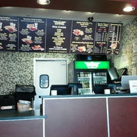 Photo taken at Wingstop by Cris G. on 4/20/2012