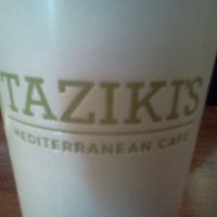 Photo taken at Taziki&amp;#39;s Mediterranean Cafe by Russell C. on 2/9/2012