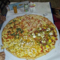 Photo taken at Márcio&amp;#39;s Pizzaria by Anderson A. on 8/18/2012