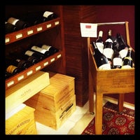 Photo taken at Grand Cru Vinos by Tatiane G. on 5/19/2012