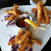 Photo taken at Buzz&amp;#39;s Wharf Resturant by Terri E. on 5/16/2012