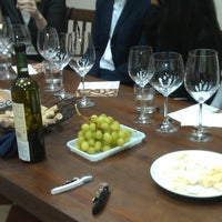 Photo taken at Wine Room by Gennadii K. on 2/21/2012