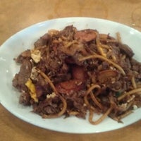 Photo taken at bd&amp;#39;s Mongolian Grill by Heidi S. on 3/17/2012