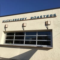 Photo taken at Huckleberry Roasters by Devin R. on 6/23/2015