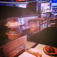 Photo taken at Umi Sushi + Tapas by Jess S. on 11/18/2014