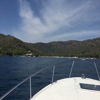 Photo taken at Cala Montjoi by Peggy C. on 8/28/2018