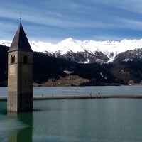 Photo taken at Reschensee / Lago di Resia by Anya V. on 4/13/2015