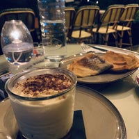 Photo taken at Café des Phares by Muhammed on 7/31/2019
