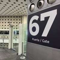 Photo taken at Sala/Gate 67 by Carlos L. on 11/24/2022