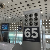 Photo taken at Sala/Gate 65 by Carlos L. on 11/28/2022