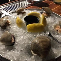 Photo taken at Mine Oyster Restaurant &amp;amp; Raw Bar by Clara S. on 6/28/2019