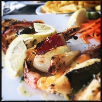 Foto tirada no(a) Restaurante Praia dos Reis Magos por Sabine W. em 7/30/2017