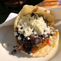 Photo taken at Arepas Cafe by Monica on 5/14/2021