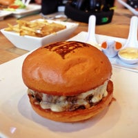 Photo taken at Umami Burger by Angela on 9/2/2013